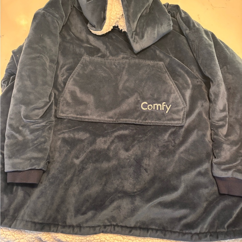 Comfy kids hooded blanket in blue. Fits kids sizes 6-10.